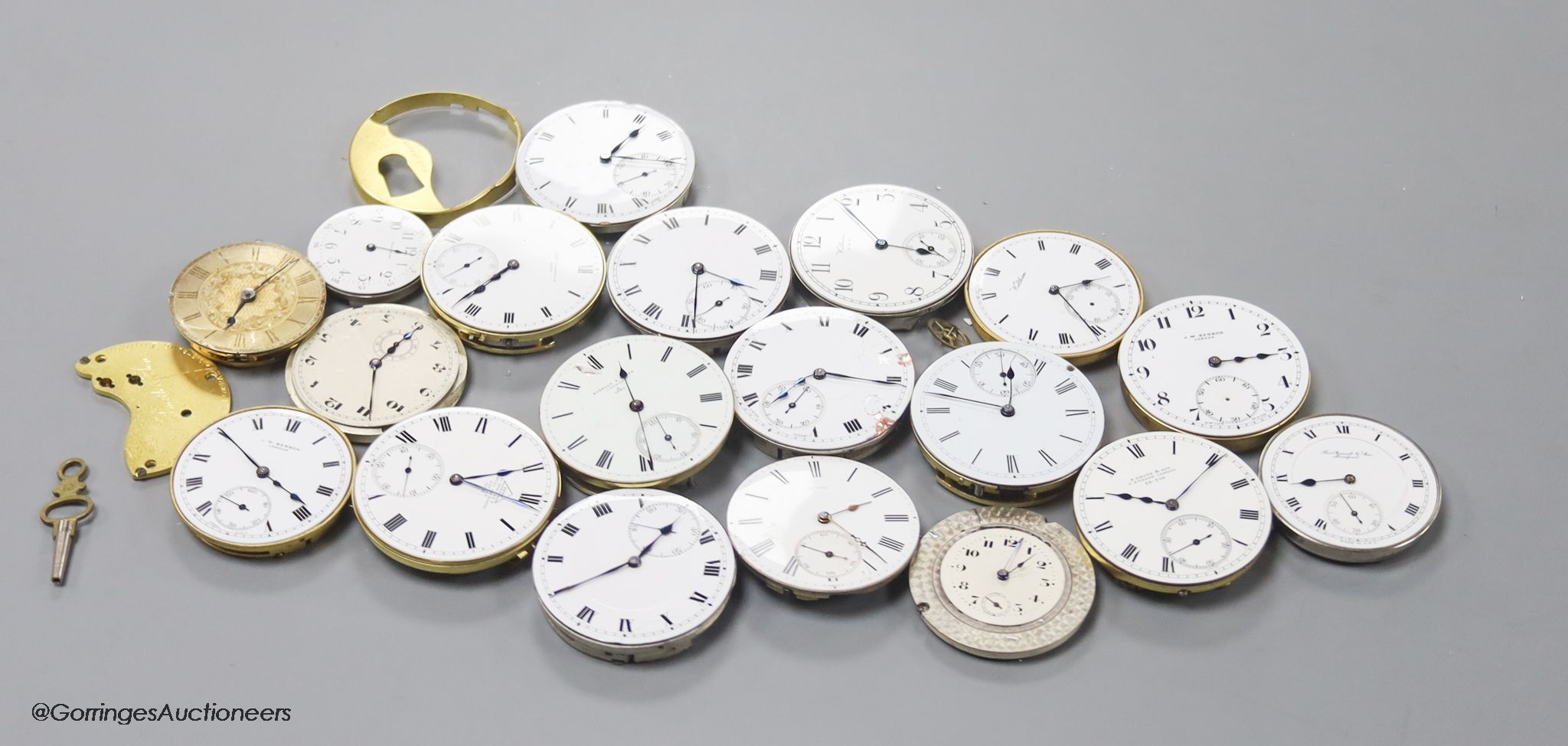 A small collection of assorted pocket watch movements, including Waltham & Tavannes.